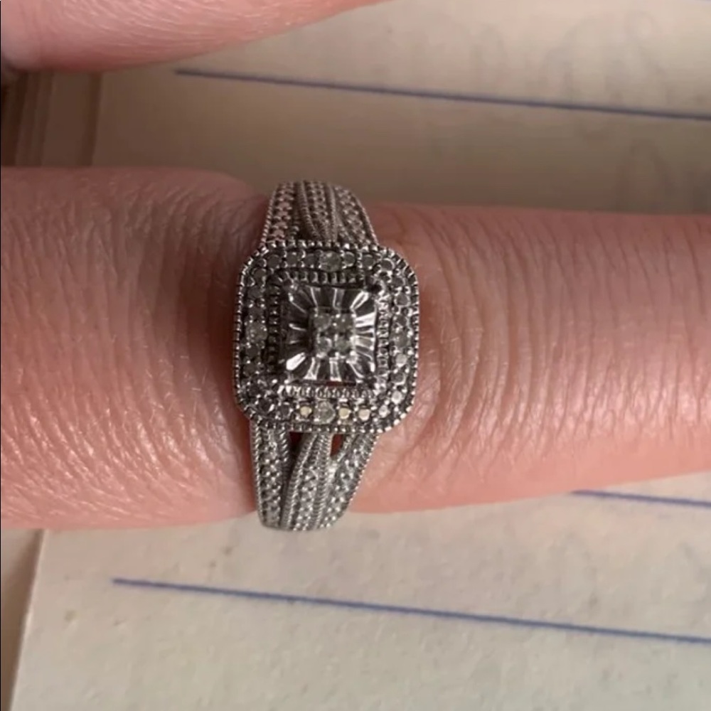 Silver and diamond ring